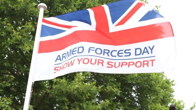 Union Jack flag, with words which say, &#039;Armed Forces Day show your support&#039;.