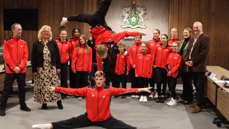 Members of the Bromley Valley Gymnastic Club in the Council Chamber, with the Portfolio Holder and ward councillors.