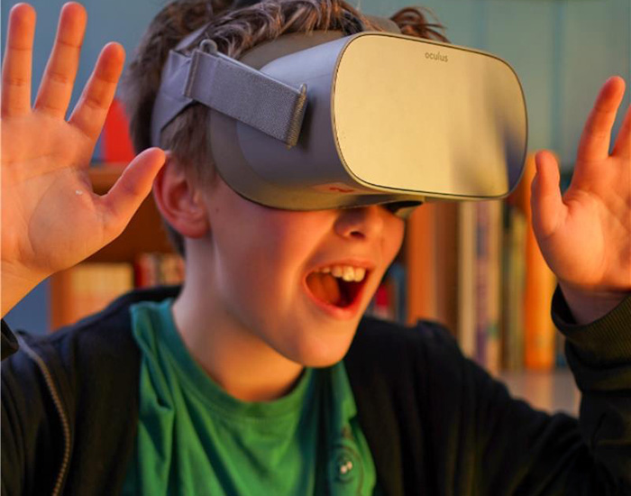 Next Thing Education - WOW Tech - Elmstead Wood Primary: Photo of child wearing a VR headset.