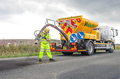 Velocity pothole repair machine