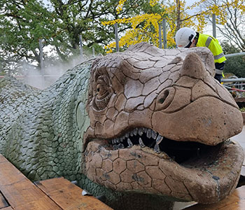 Crystal Palace dinosaur being spray cleaned as part of the restoration works.