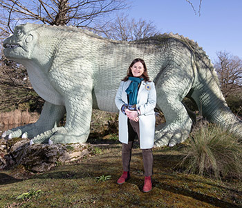 Eilish McGuinness CEO of National Lottery Heritage Fund in front of Crystal Palace Dinosaur. Copyright Chris Gorman