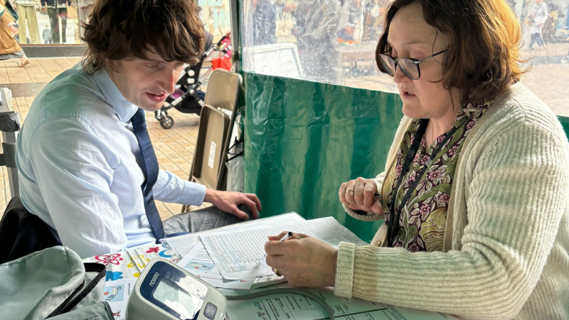 Photo of a man having his blood pressure checked at previous Know Your Numbers event hosted by Bromley Council.