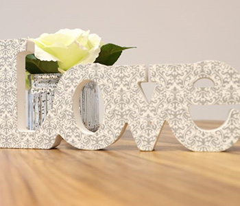 White patterned letters spelling the word Love.