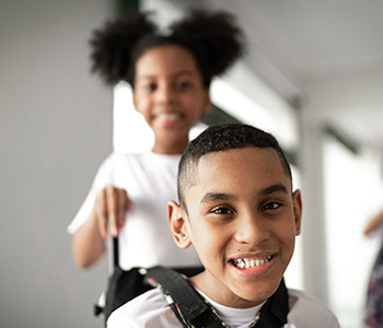 A young girl who is representing a young carer looking after her disabled brother.
